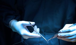 veterinarian surgery in operation room take with art lighting and blue filter
